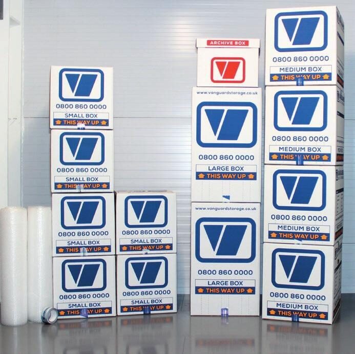 A photo of a set of Vanguard cardboard boxes and bubble wrap, available to buy from Vanguard's packing materials.