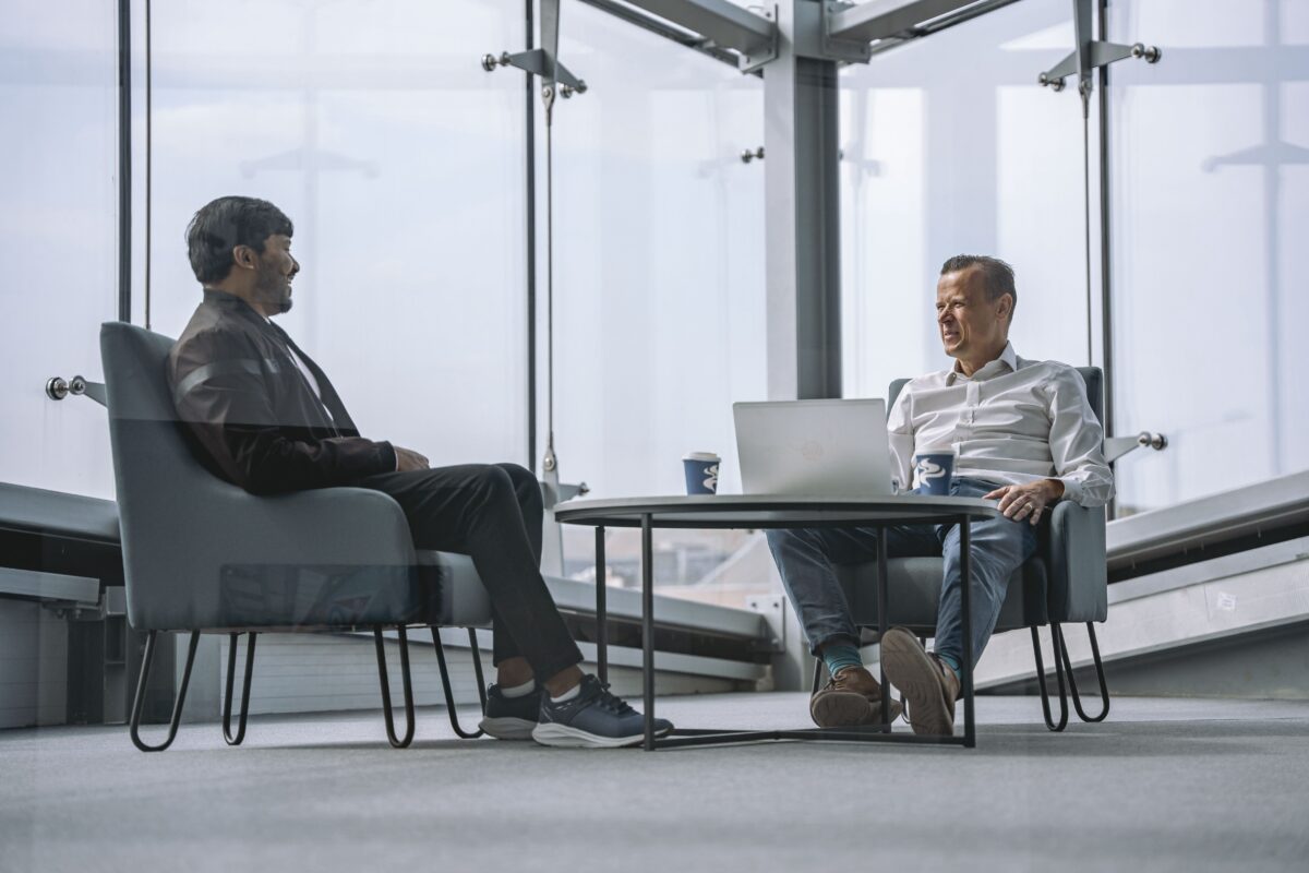 Two people sitting in the seating area at Vanguard Storage Bristol
