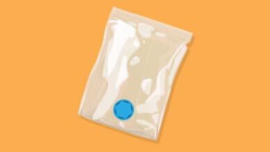 A graphic of a plastic vacuum storage bag on a yellow background.