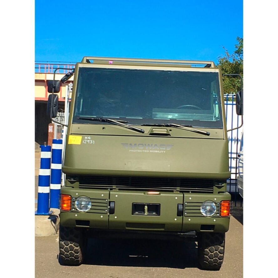 A photo showing a military truck.